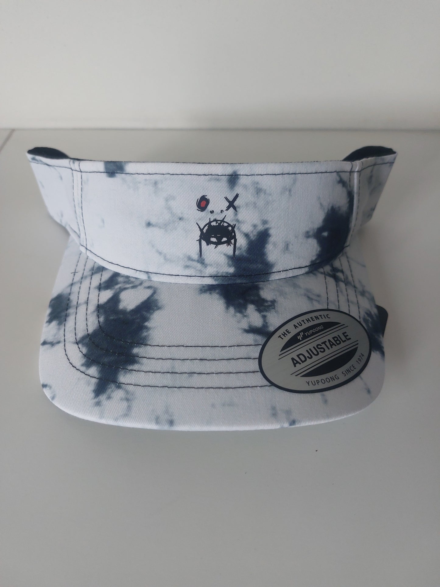 Curved visor cap