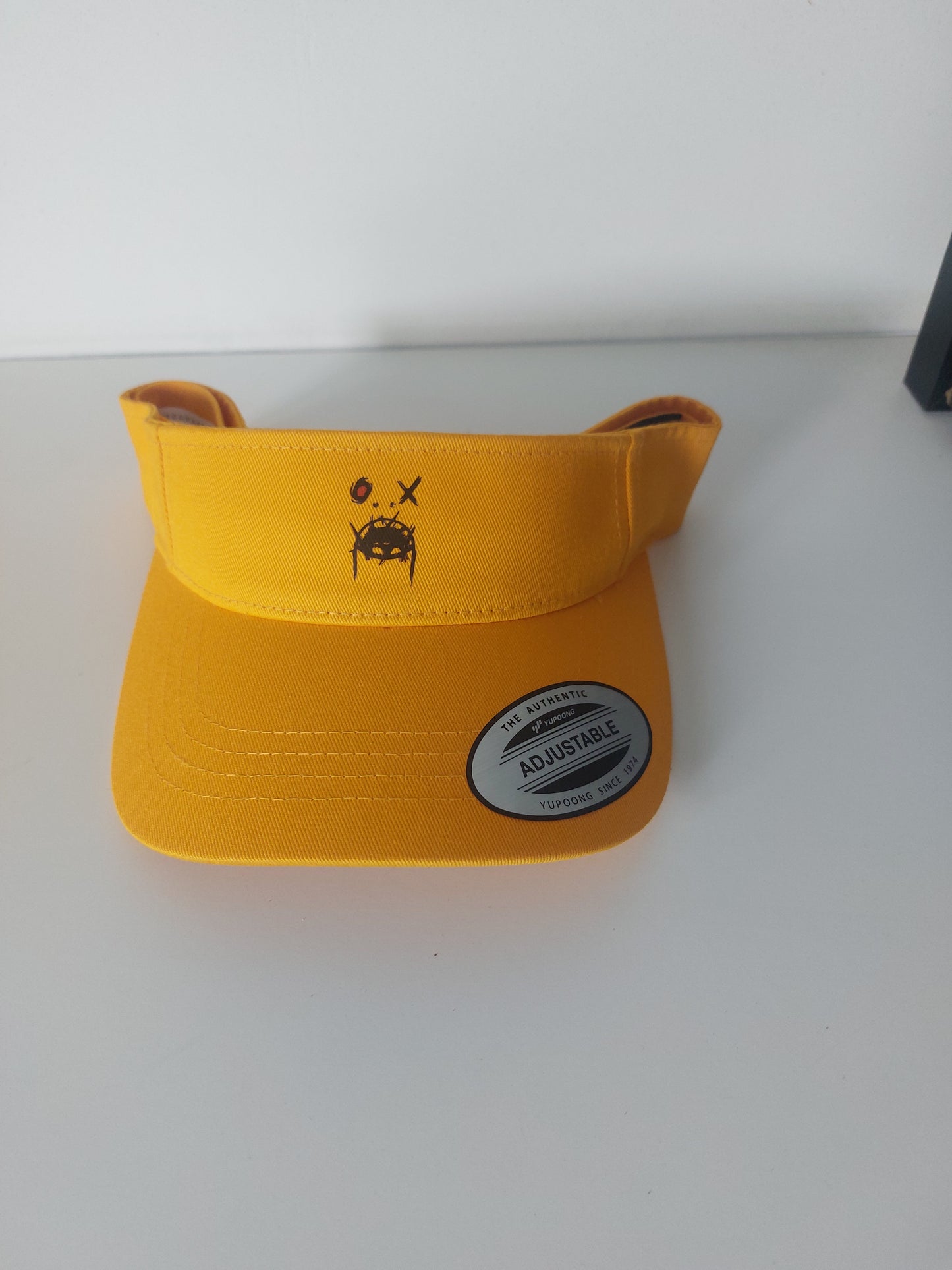 Curved visor cap